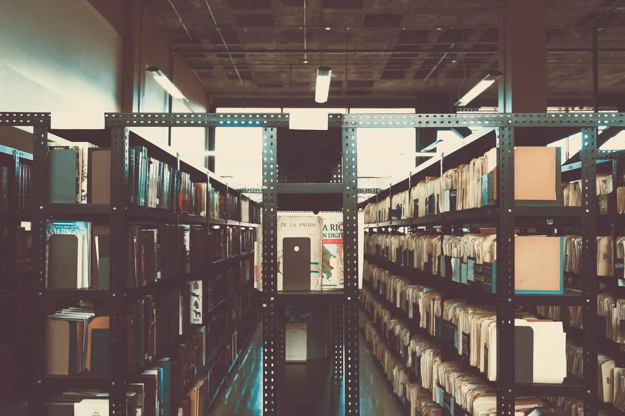 Bookshelves in a library with a vintage tone in San José, Costa Rica.