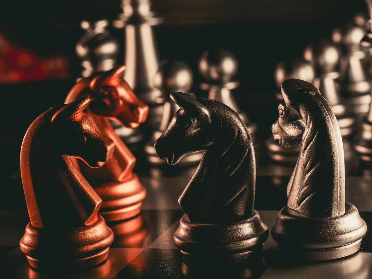 Chess pieces balanced on a scale depicting equality or strategy in decision making.